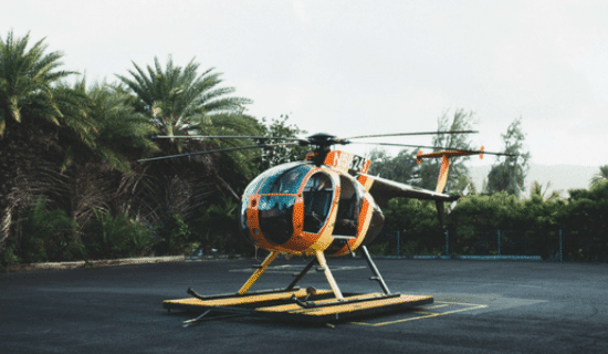 An orange and yellow helicopter