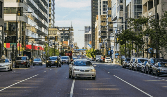 A car changing lanes in a city