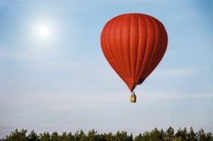 Sigle air balloon in blue sky