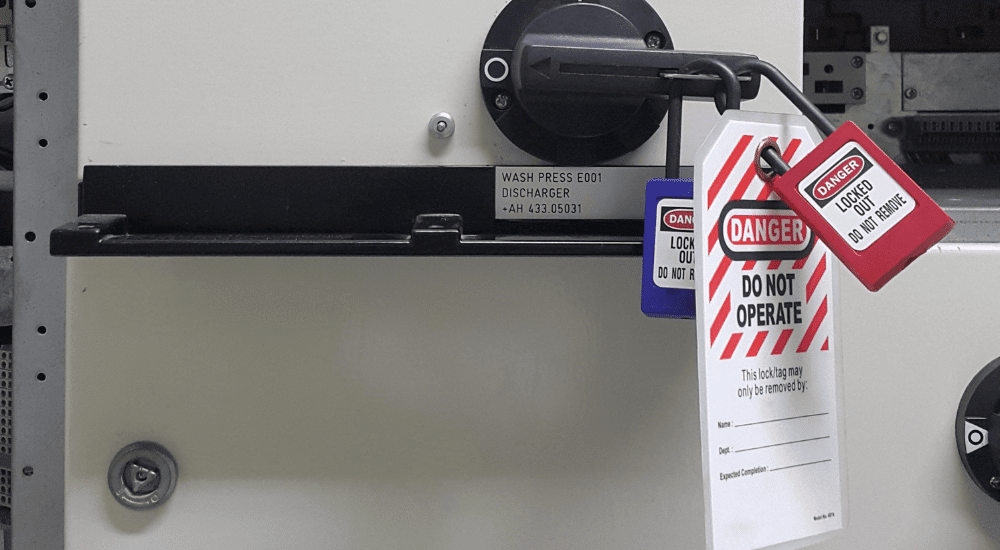 lockout tagout tags on an electrical device