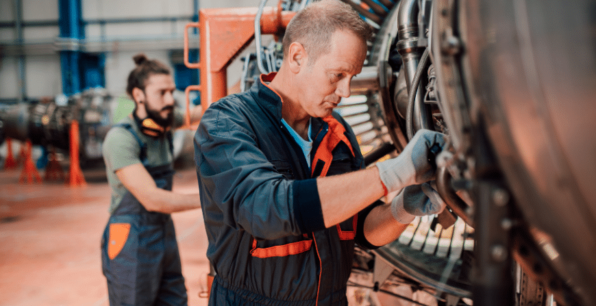 an airplace mechanic assembling a plane