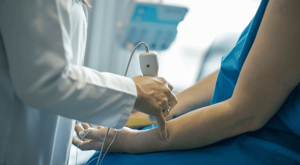 a doctor running tests on a patient